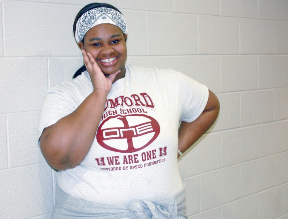 <p>Junior Anastasia Quails was caught wearing her “We are one” T-shirt on Oct. 29. The shirts were purchased with funds from a $5000 grant from DPSCD Foundation given to support the merging of the two small schools.&nbsp;</p>