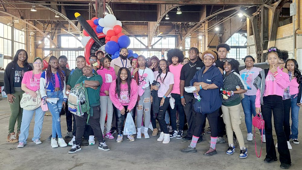 Cody students pose for a picture at City Airport. PHOTO BY CODY CONNECTION