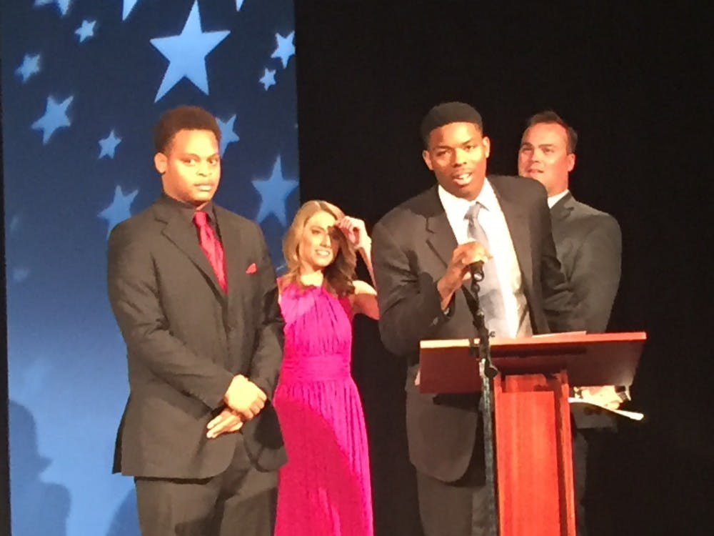 <p>Emmy1: Douglass seniors Kamar Graves and Drake Glover receive an Emmy for their rap video “Peace.”</p>