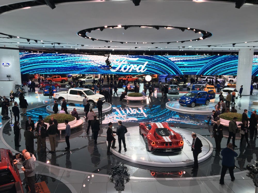 <p>Thousands of reporters gather at the North American International Auto Show in Detroit.</p>