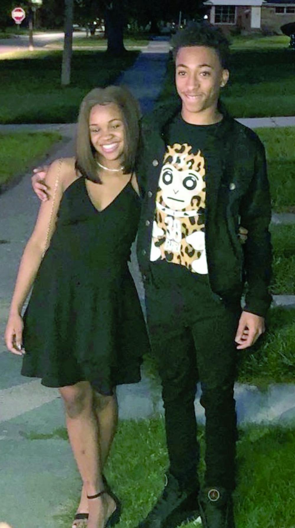 <p>Sophomores Imani Peterson and Javier Hicks pose for a photo on their way to Mumford’s homecoming dance on Oct. 5. Peterson and Hicks were able to get tickets despite the limited supply.</p>