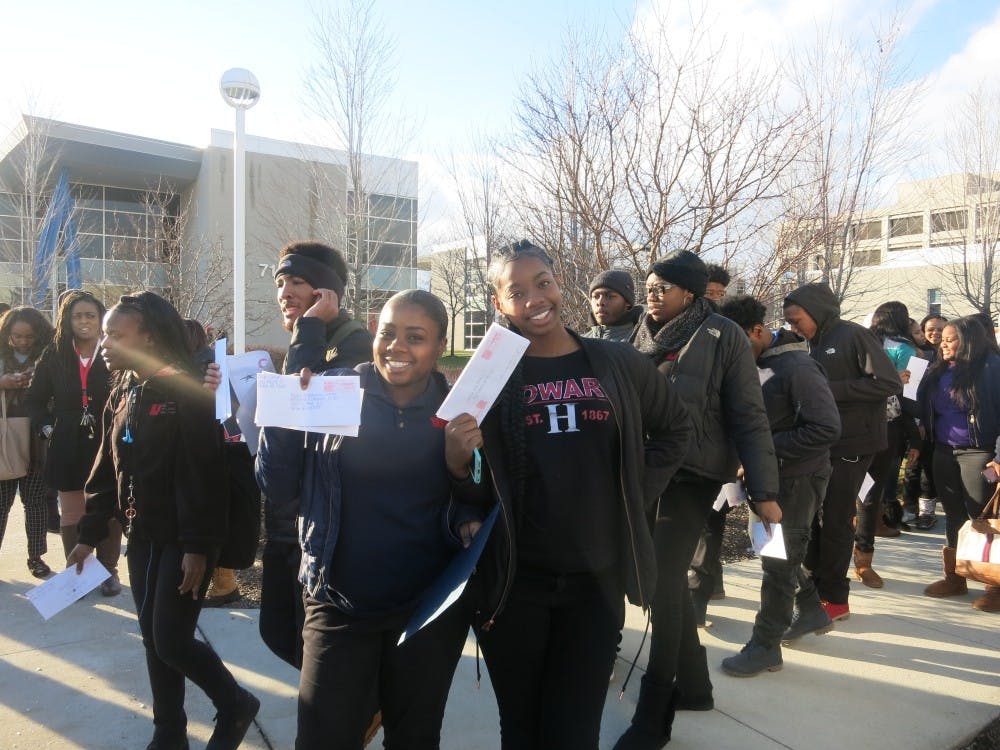 <p>March to Mailbox Uprep seniors Shelbi Smith and Anayah Gorman&nbsp;march&nbsp;to mail their college applications.&nbsp;</p>