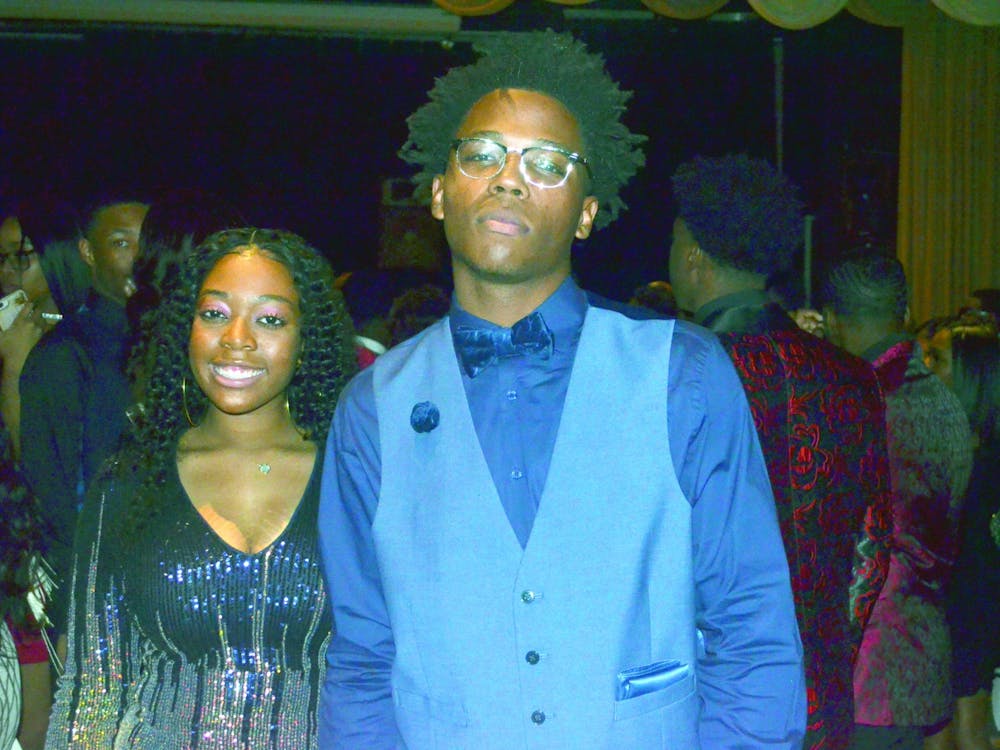 Senior Jovan Henderson and Terriona McCrary show off their homecoming attire. Photo by Zaria Newton.