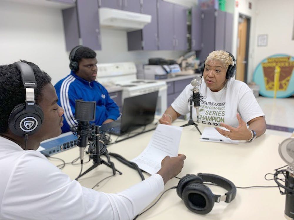 Journalism students interview Southeastern counselor Bettye Foster.
