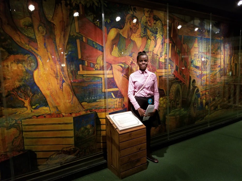 Freshman Ashley Williams enjoys the artistry at the Michigan Historical Museum.