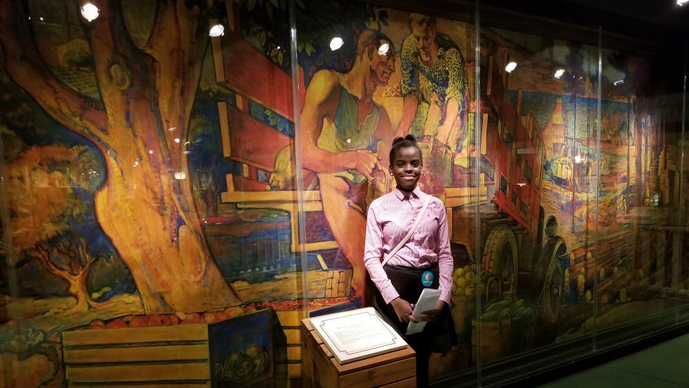 Freshman Ashley Williams enjoys the artistry at the Michigan Historical Museum.