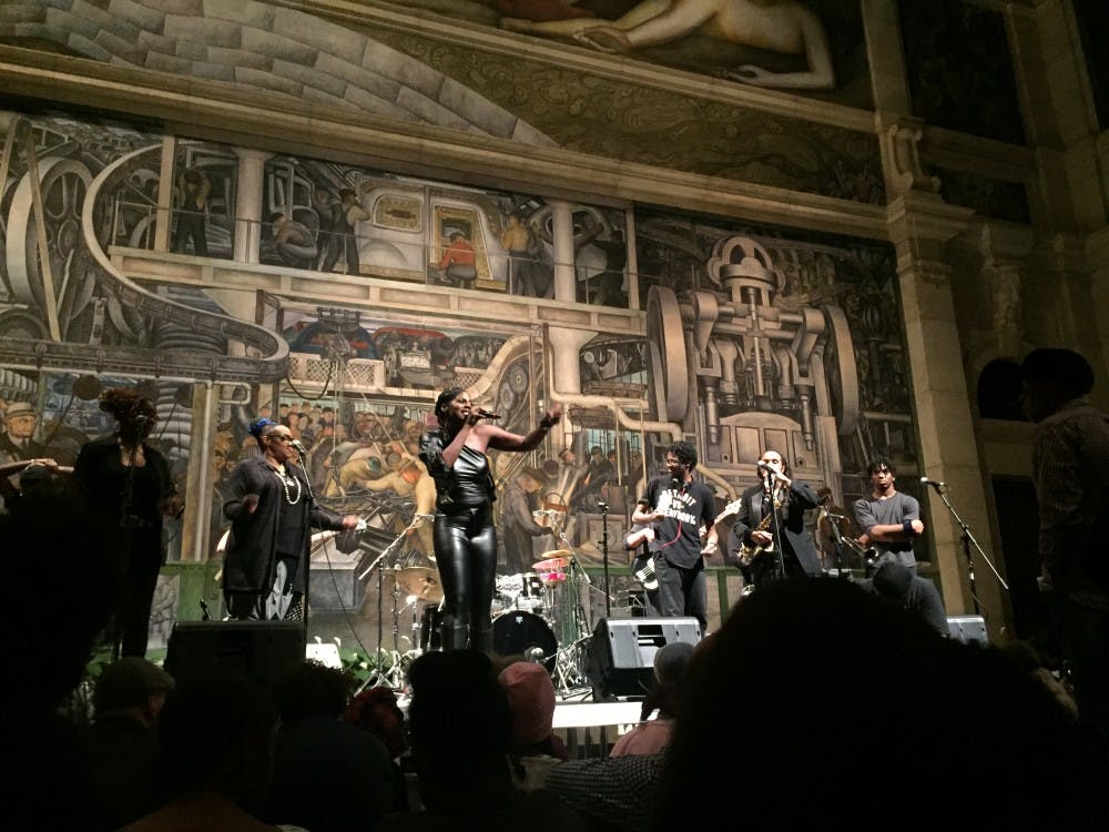 Mahogany Jones performing at the Detroit Institute of Arts with her live band.