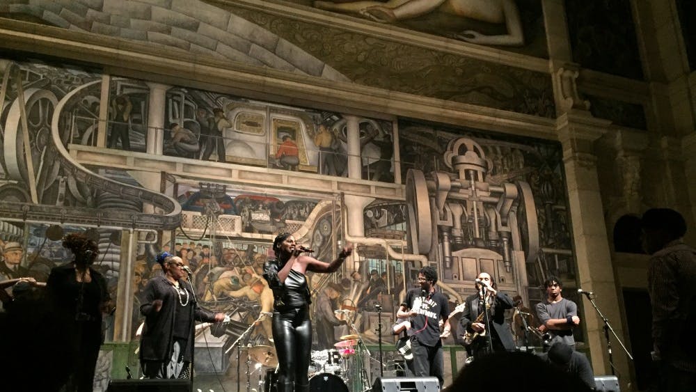 Mahogany Jones performing at the Detroit Institute of Arts with her live band.