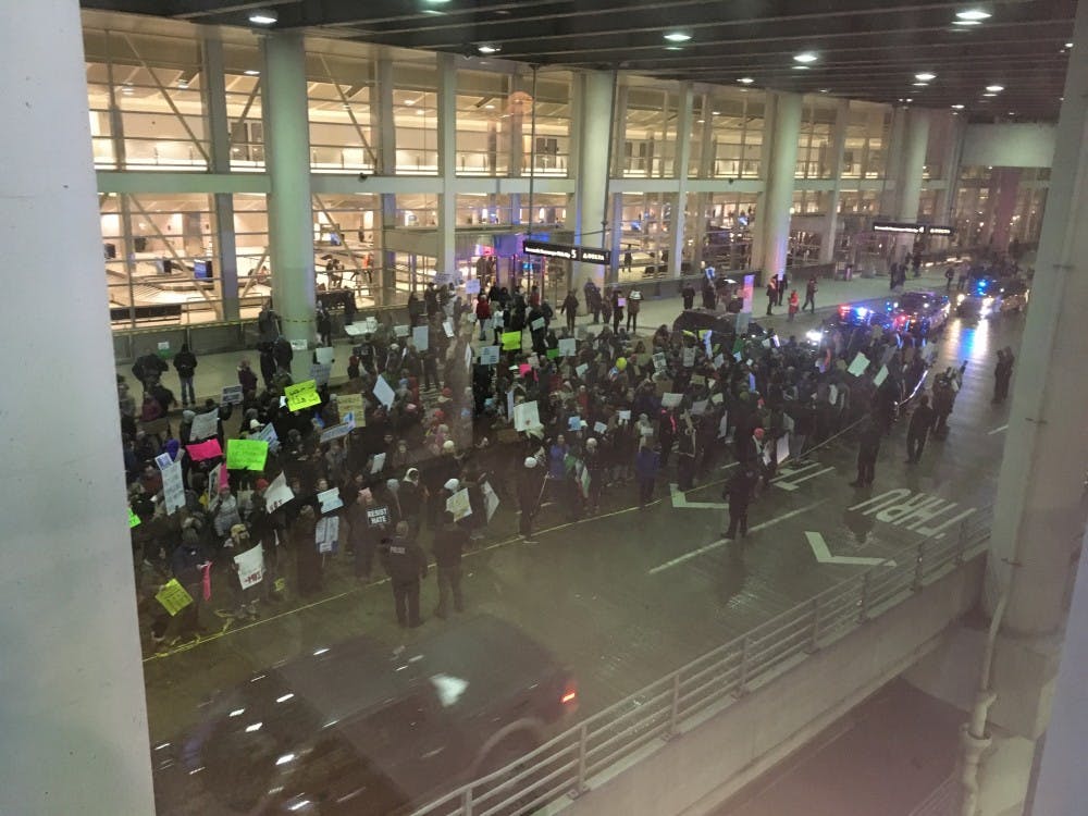 <p>Detroit city and suburbs united Jan. 29, 2017 at Detroit Metro Airport for a #NoMuslimBan protest against Donald Trump's first immigration ban. </p>