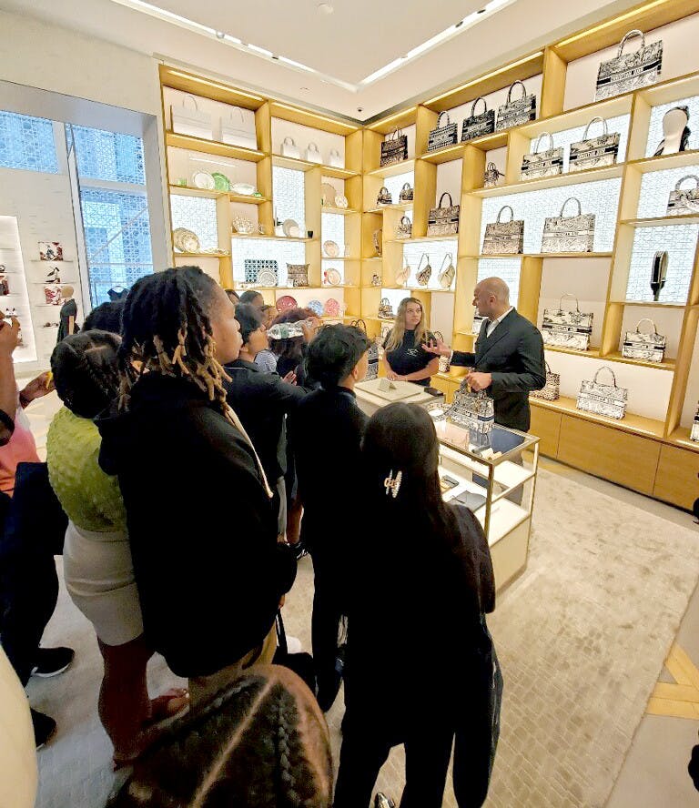 CT students listen in on a presentation by a Dior representative. PHOTO COURTESY OF YOLANDA GORDON&nbsp;