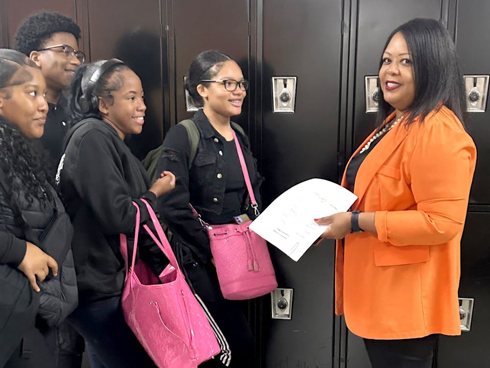 New assistant principal Tisha Lewis gives students morning encouragement. PHOTO BY CRUSADERS’ CHRONICLE&nbsp;