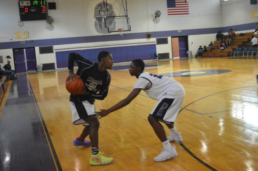 Preparing to dominate Central High School, No.&nbsp;32 Waverly Bumbrey warm ups with his teammates.&nbsp;