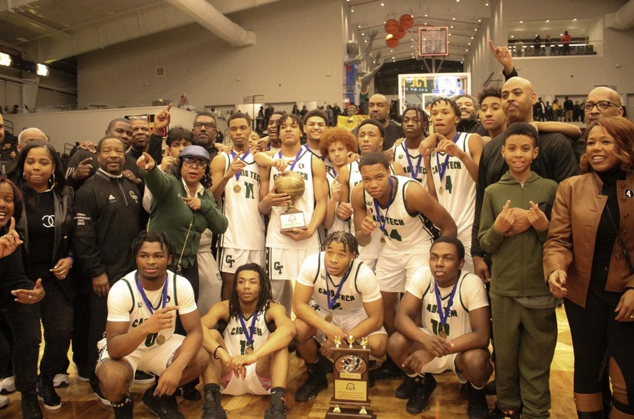 The Cass Tech boys basketball Team celebrates the PSL City Championship. Photo by Je’Den Morrison.