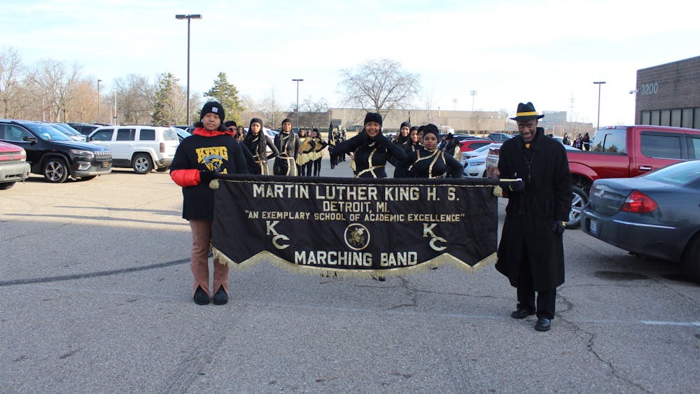 The marching band prepares to start the MLK Day parade. Photo by Crusaders' Chronicle.