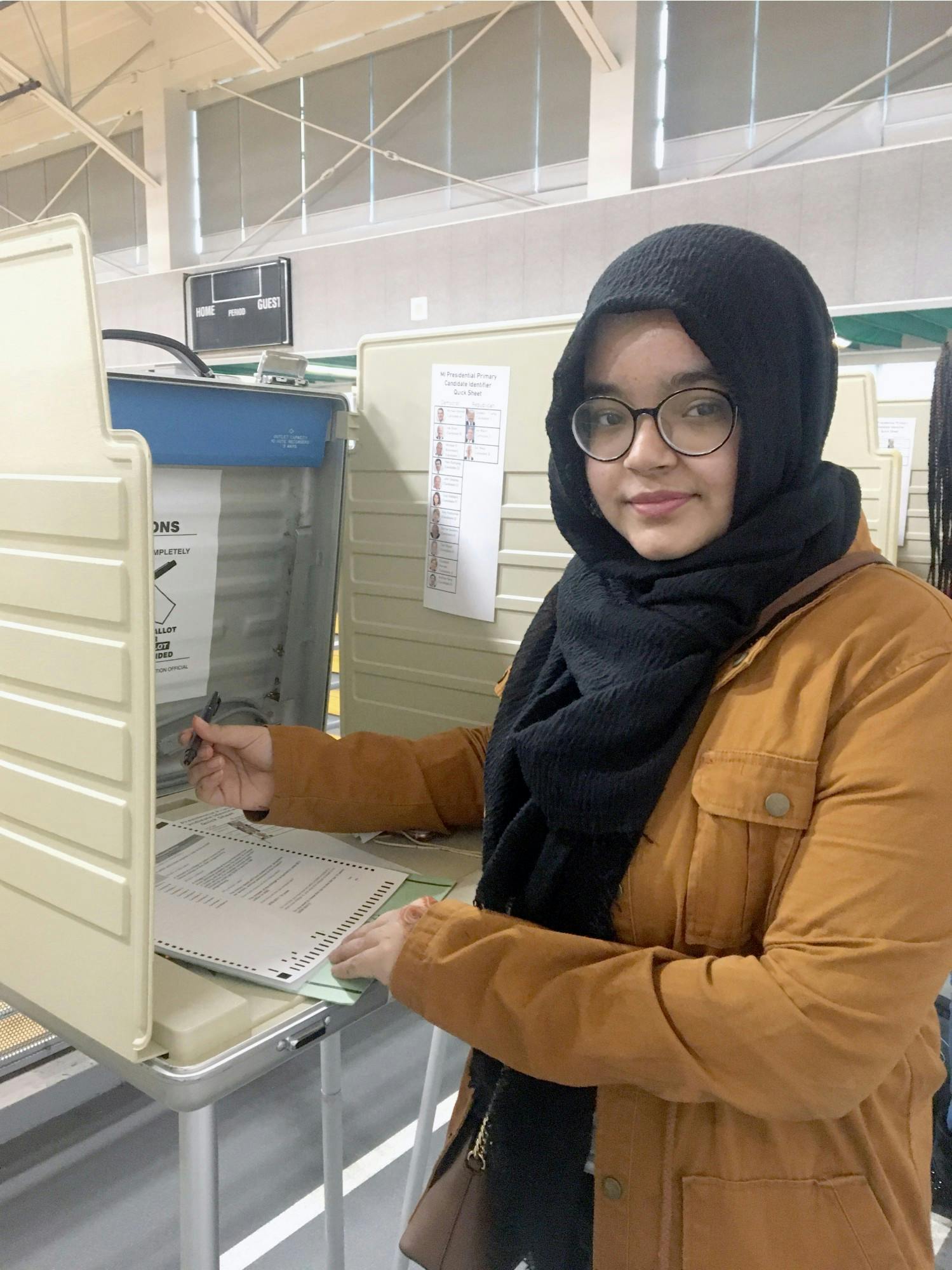 Senior Sadia Rahman casts her vote. Photo by Naja Johnson.