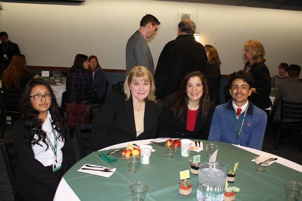 <p>Landon Borrego, far right, with work partners at the 2017 Corporate Work Study Partner Appreciation Breakfast&nbsp;</p>
