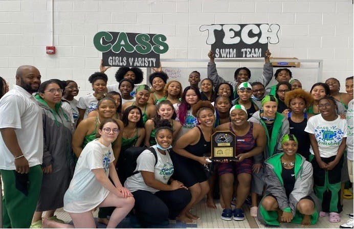The Cass Tech swim team celebrates win after PSL Championship meet. Photo by Ja’Von Waters Jr.&nbsp;
