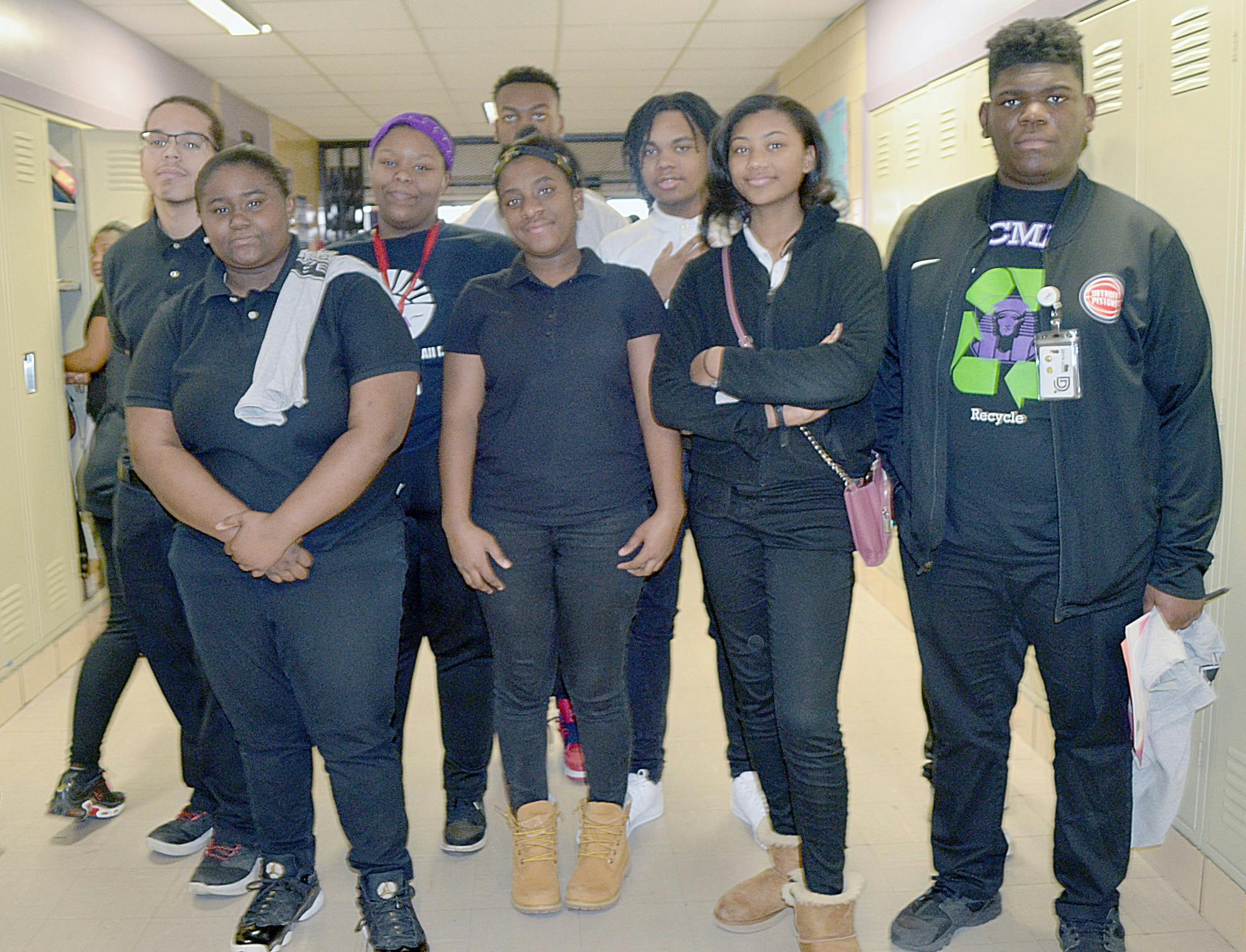 Communication and Media Arts robotics team members pose for a group photo.