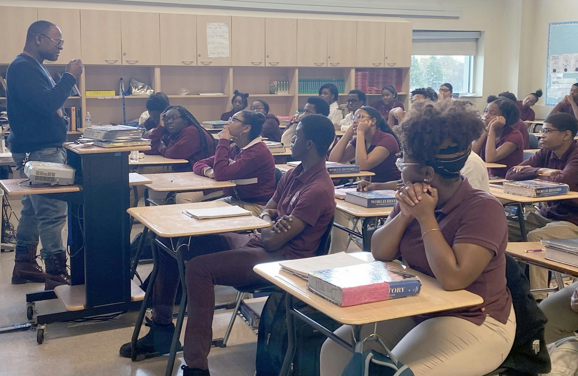 RHS social studies teacher Mr. Johnson discussing current events with his world history and geography class. Photo by Joielle Speed.