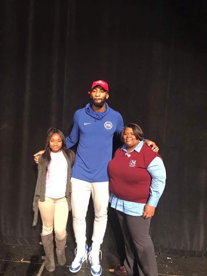 (Staff Photo/Mustang Voice) Detroit Piston Andre Drummond poses with senior Ebony Norwood and Mumford H.S. Principal Angela Prince on Oct. 24&nbsp;after awarding the school with prizes for a winning video produced by Norwood.&nbsp;