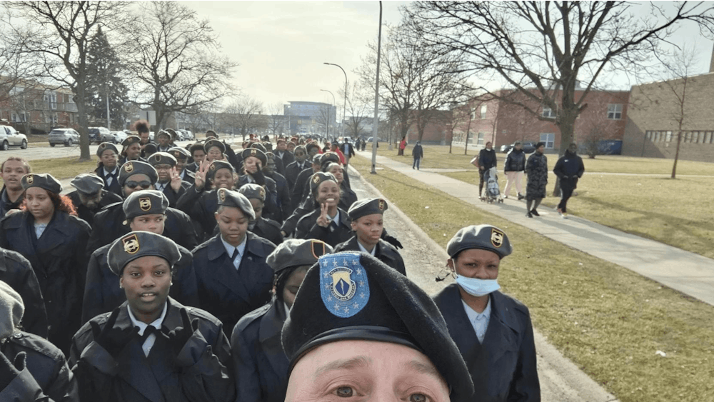 First Sgt. John Hamilton takes a picture of himself and the cadets during the Martin Luther King Jr. march. Courtesy photo.