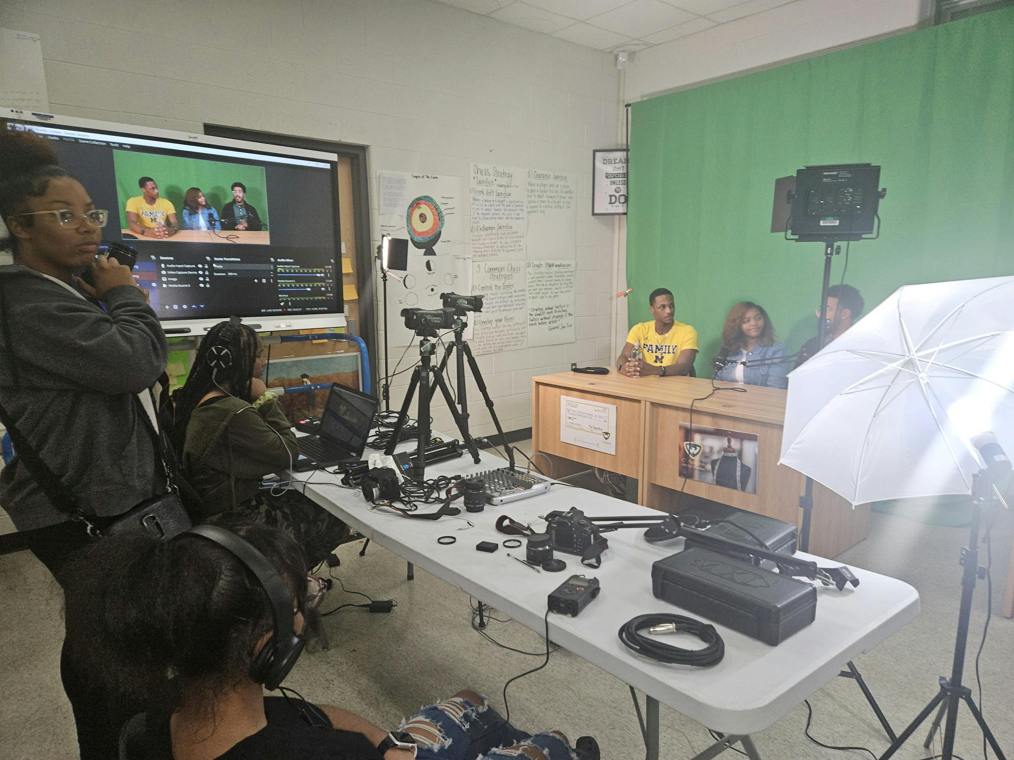 Students film interviews with college students from U of M and Wayne State University. Courtesy photo.
