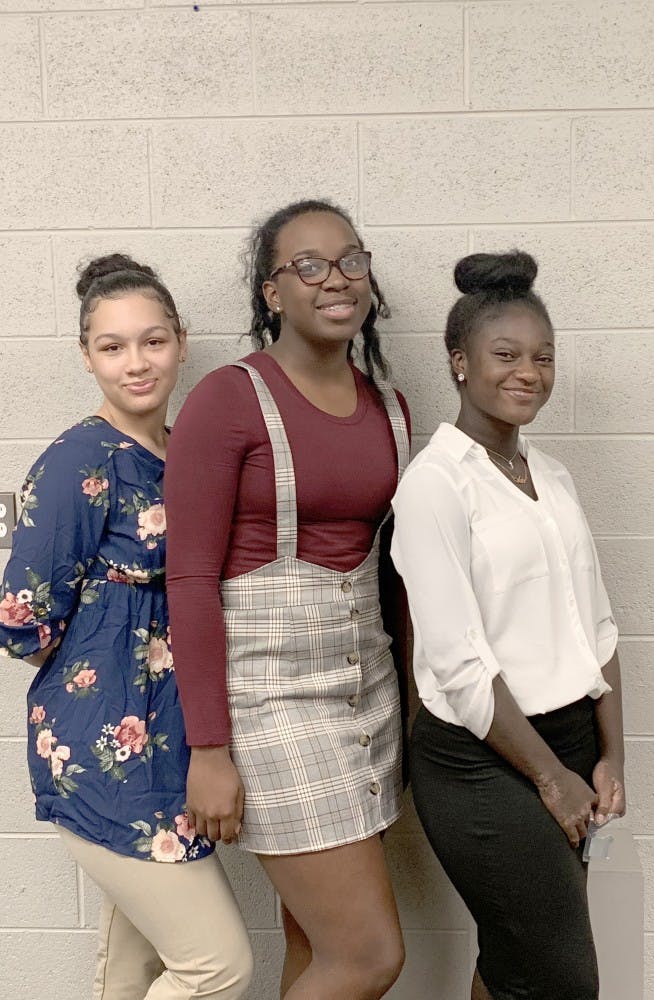 Girls volleyball members Alicia Stanley, Paige Love, and Adriana Dent all received Catholic League Honors this year.