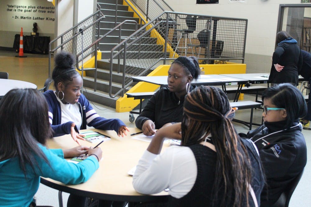 Mentor Delana Bailey discusses how to deal with life challenges with her four ninth grade mentees.