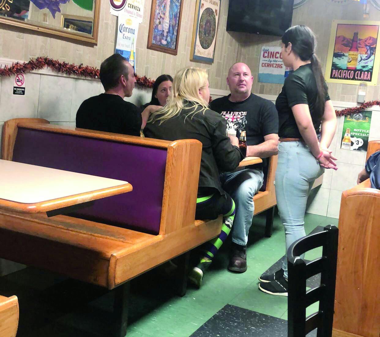 A Western student waits tables at a southwest Detroit restaurant.&nbsp;