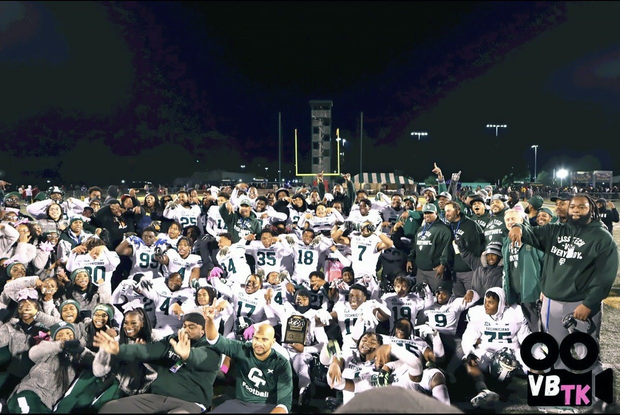 Cass Tech Football Team celebrates after the PSL City Championship win.
Photo by Karrington Watson.

