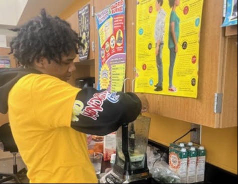 Students serve up smoothies during the third annual health fair at EEVPA. Courtesy photo.