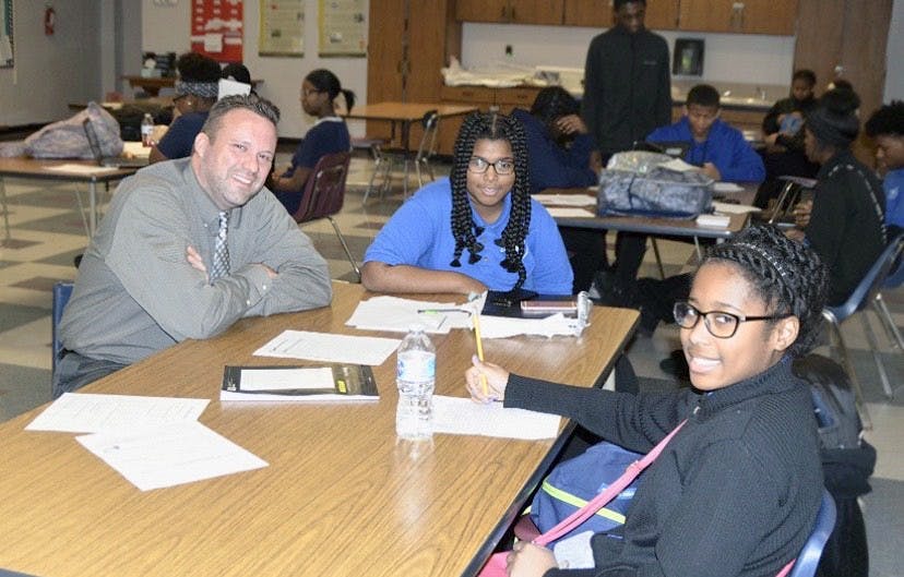 &nbsp;Freshmen Ulyssia Jordan and Adrianna Holmes visit with Principal Sean Lively.