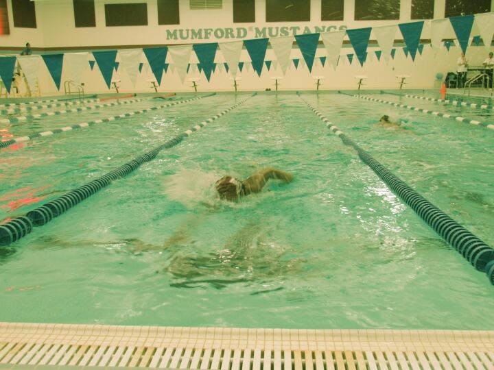 Swimmers practice in a nearly empty pool after school at Mumford on Feb. 13. Photo by Derrica Searcy/Mustang Voice