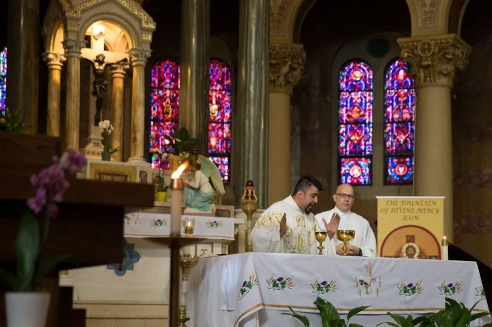 <p>Fr. Jose presides over mass.</p>