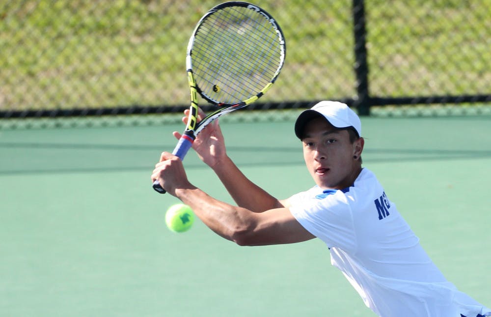 <p>University of Memphis sophomore tennis player Ryan Peniston hits the ball against Temple in an earlier match this season. Peniston has a 26-8 individual record.&nbsp;</p>