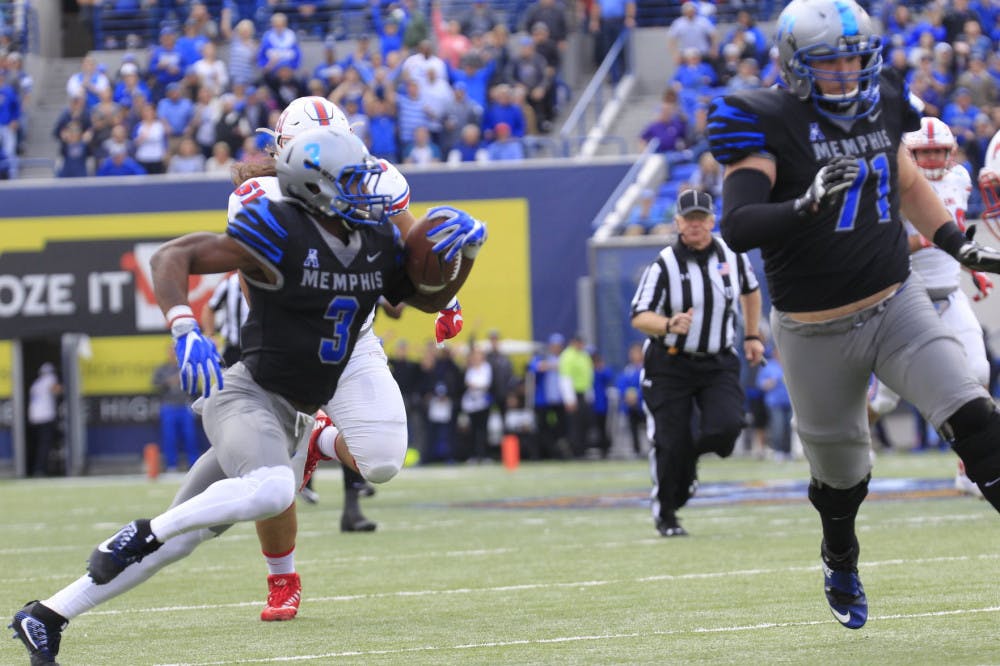 <p>Anthony Miller runs with the ball after a reception. Miller finished the game with 163 yards and two touchdowns.&nbsp;</p>