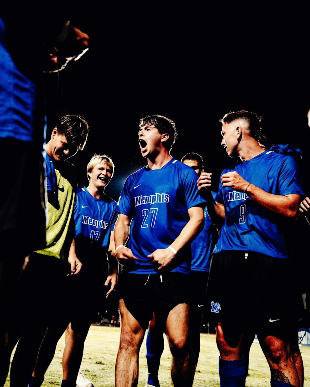 Memphis midfielder Anthony DiFalco (27) celebrates with his teammates after the Tigers defeated 9th ranked Charlotte.