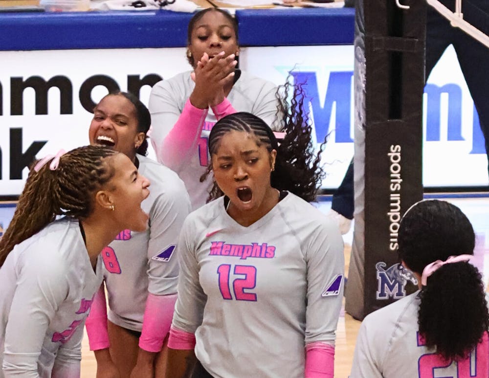 <p>Janyah Henderson celebrates winning a point with her teammates in Memphis&#x27; 3-0 loss at home against Southern Illinois Wednesday night.﻿</p>