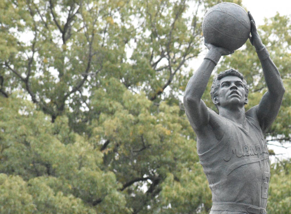 <p>The statue of Finch that now sits at the plaza bearing his name. "Though I know he loved me and his family, my husband had a passionate, love affair with basketball that I learned to accept and encourage," his widow Vicki said.</p>