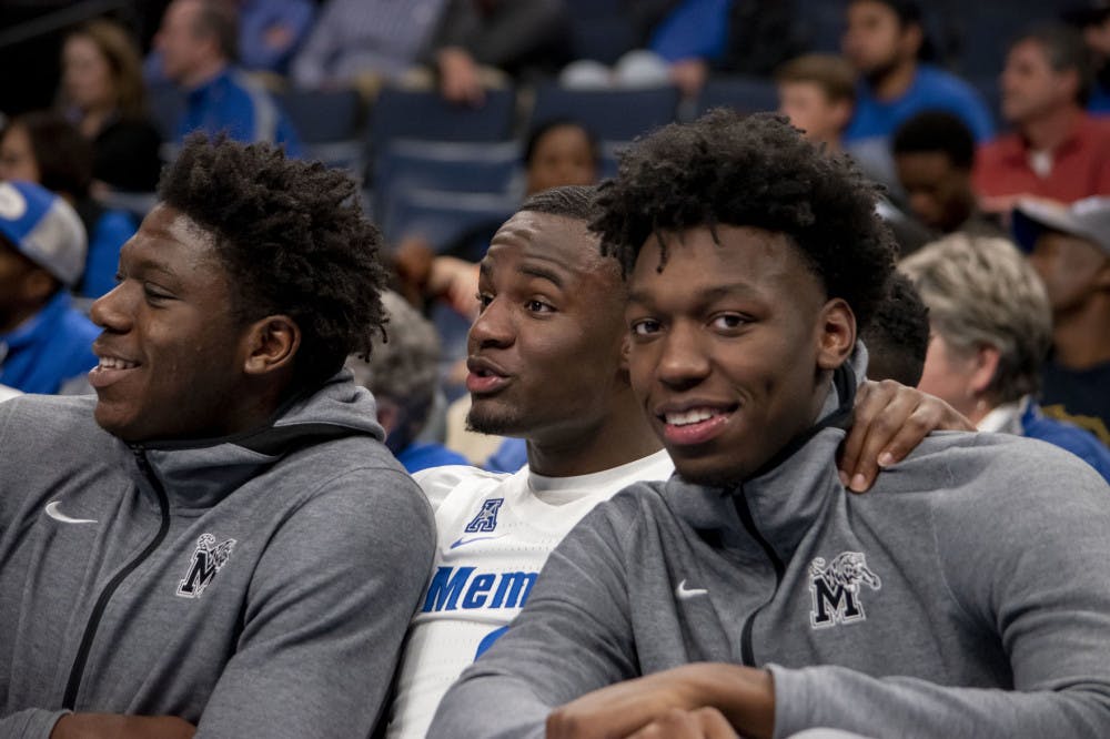 <p>Malcolm Dandridge, Alex Lomax and James Wiseman (in order) enjoying their time on the bench.&nbsp;</p>