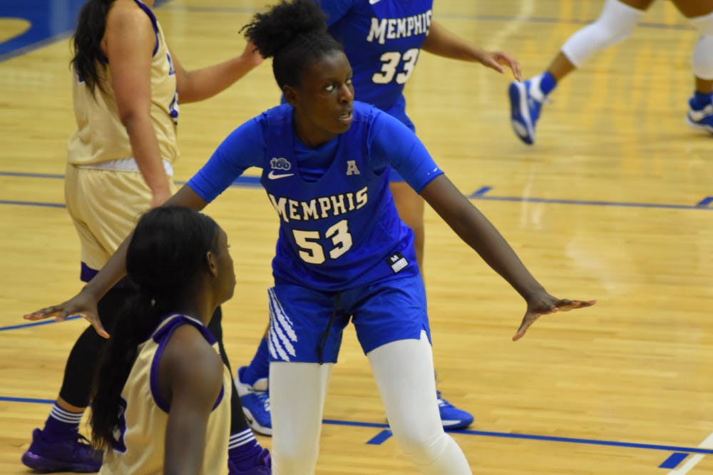<p>Lanetta Williams shows aggressive defense against defender. The Memphis Tigers defeated Southern Illinois 70-66 on the road to snap their three-game losing skid.&nbsp;</p>