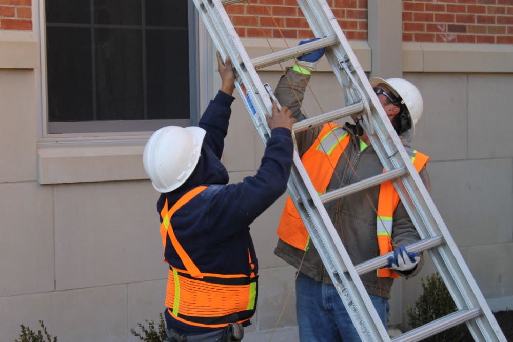 <p>The University of Memphis’ new $53 million dorm still has contractors working both in and outside of it. Contractors were still molding bricks and filling holes outside on Thursday. Inside Centennial Place, some students complained about maintenance issues as well.</p>