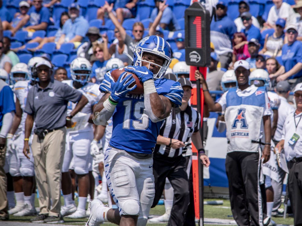 <p>Kenneth Gainwell making a grab for the Memphis Tigers. Gainwell rushed for 145 yards on 16 carries and a touchdown in a 42-6 victory over South Alabama.</p>