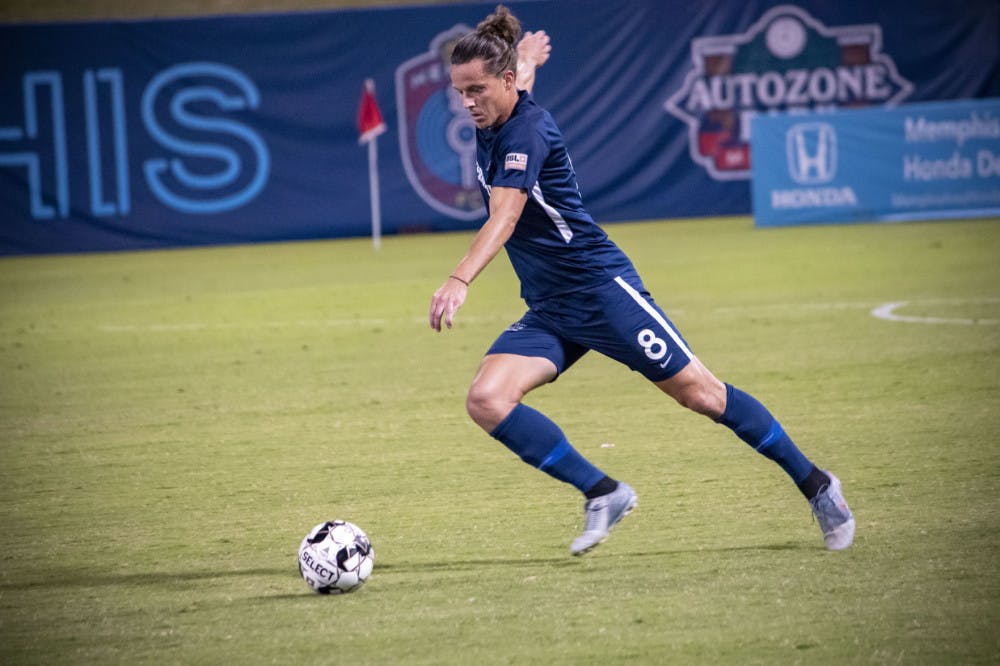 <p>Marc Burch goes for a long ball pass from midfield. Memphis 901 FC finished their inaugural season with a 9-7-18 record.</p>