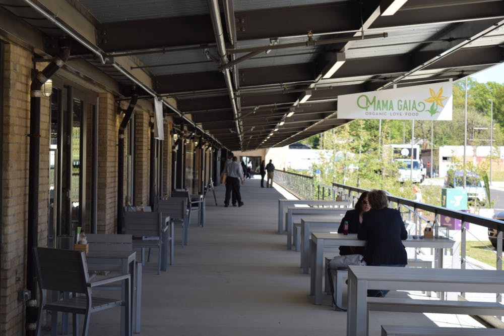 <p><strong>The Crosstown Concourse reopened as a vertical urban village in August. Its revitalizers intended for “mission-oriented” restaurants like Next Door and Mama Gaia, who both serve organic locally-sourced food, to be included in the building.&nbsp;</strong></p>