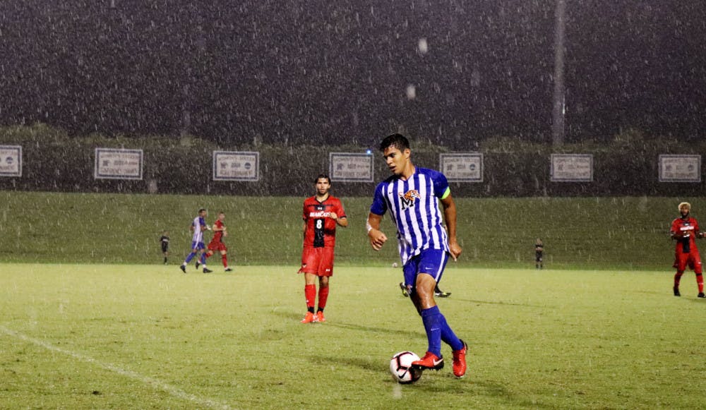 <p class="p1"><span class="s1"><strong>David Zalzman dribbling the ball in the midfield during a rainy night against Cincinnati. Zalzman helped lead the Tigers to the AAC Conference tournament semifinals in his final season.</strong></span></p>