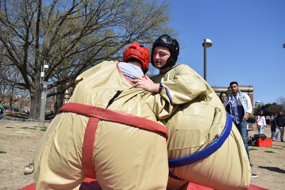 <p>Asian American Association's "Sumo Suits" event attracted plenty of eager wrestlers to the UC Lawn Thursday. AAA is using unique experiences such as these to share Asian culture with U of M students.</p>