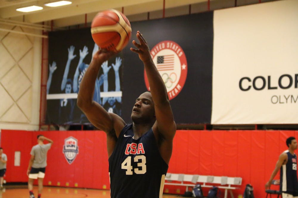 <p>Memphis signee Alex Lomax gets up a shot during USA Basketball camp. The guard played high school basketball for now-Memphis head coach Penny Hardaway at East High School.&nbsp;</p>