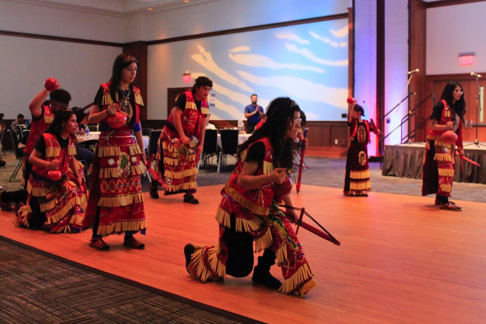 A group of dancers perform a cultural dance at the Hispanic Heritage dinner Wednesday night.