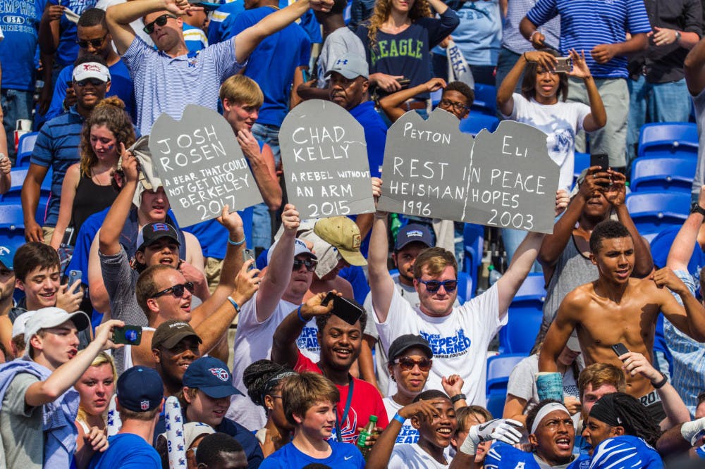 <p>The student sections holds up signs during the game against UCLA. Memphis won the game 48-45.&nbsp;</p>